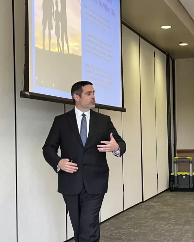 Image of attorney Thomas D. Fortenberry speaking about estate planning at a seminar in Brushy Creek